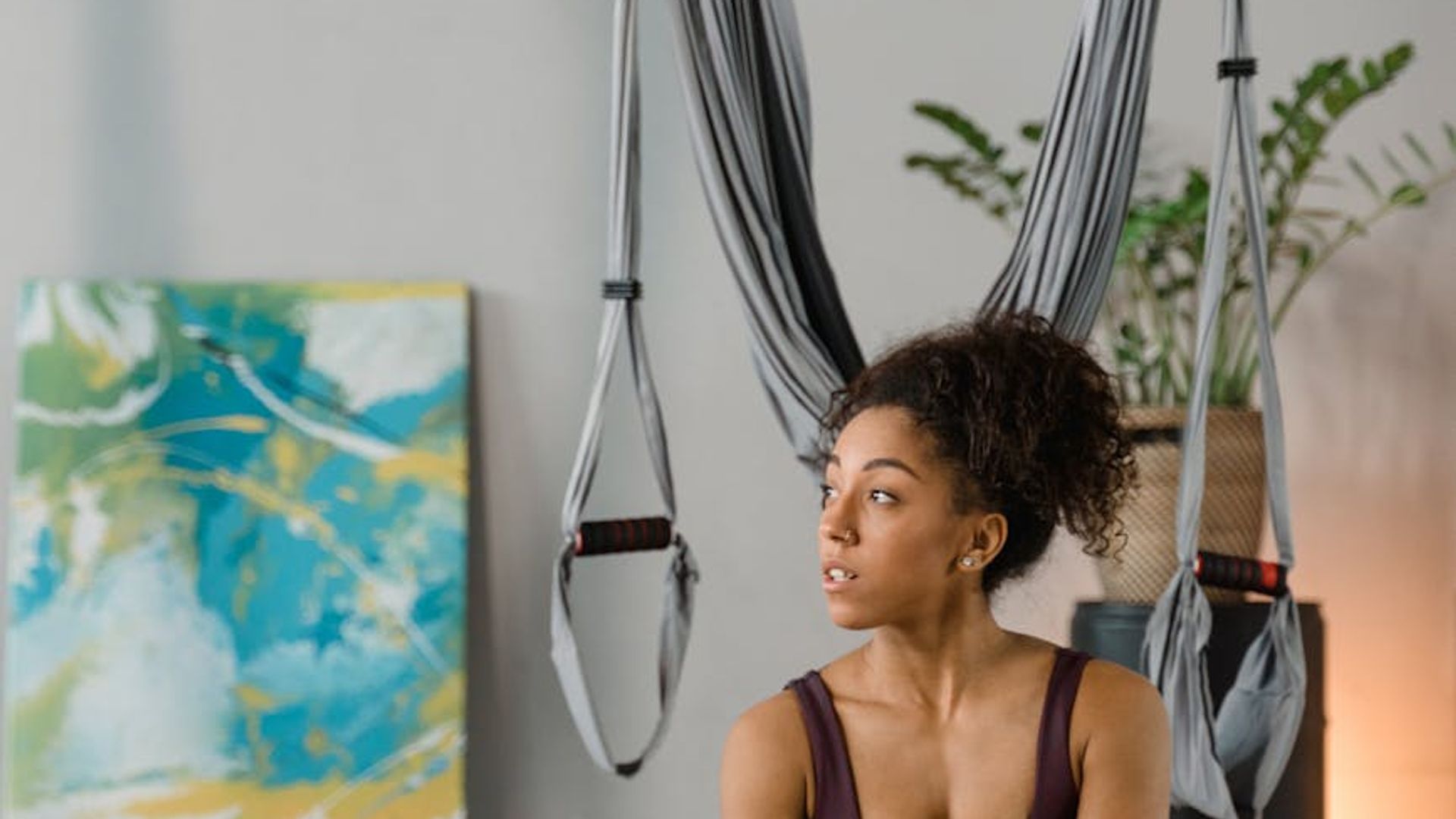 Atmospheric yoga studio with soft warm lighting