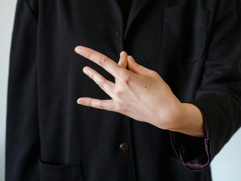 Close-up of hands in a meditative mudra position